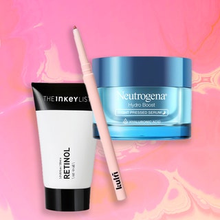 25 Allure Best of Beauty Winners Under $25: a collaged image of The Inkey List Retinol Serum, Kulfi Underlined Kajal Eyeliner, and Neutrogena Pressed Serum with Hyaluronic Acid on a marbled pink and orange background with a red 2021 Allure Best of Beauty Award Winner seal in top left corner
