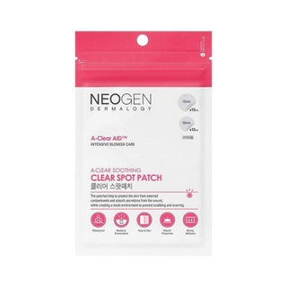 A red and white packet of Neogen AClear Soothing Clear Spot Patch on white background