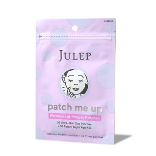 A purple packet of Julep Patch Me Up Waterproof Pimple Patches on white background