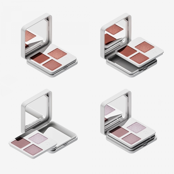 Four refillable Glossier Monochromes eyeshadow quad compacts in rose gold and lilac color schemes on a light gray background