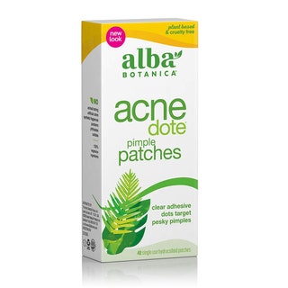 A white and green box of Alba Botanica Acnedote Pimple Patches on white background